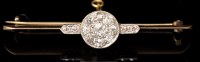 Lot 535 - A diamond bar brooch, the central old cut...