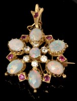 Lot 536 - An opal, diamond and ruby brooch/pendant,...
