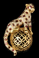 Lot 553 - A ruby, diamond and 18ct. yellow gold leopard...