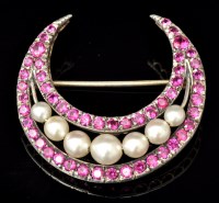 Lot 576 - A ruby and pearl crescent pattern brooch,...
