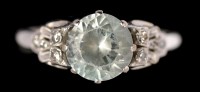Lot 592 - A zircon and diamond ring, the central...