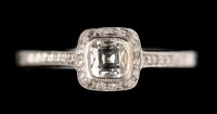 Lot 598 - A Tiffany & Co. diamond ring, the central...