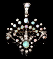Lot 600 - An Edwardian opal and diamond brooch/pendant,...
