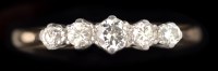 Lot 602 - A five stone diamond ring, the graduated...