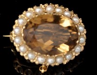 Lot 622 - A citrine and half pearl cluster brooch, the...