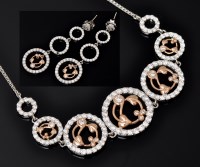 Lot 623 - A diamond rose gold necklace and matching drop...