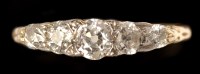 Lot 625 - A five stone diamond ring, the five graduated...