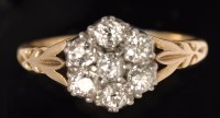 Lot 628 - A diamond cluster ring, the seven old cut...
