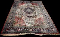 Lot 648 - A fine silk carpet, the central medallion with...