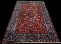 Lot 652 - A Persian Isfahan carpet, with bold scrolling...