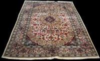 Lot 661 - A Nain carpet, the small central medallion...