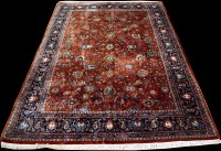 Lot 662 - A fine Tabriz carpet, with floral sprigs on a...
