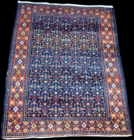 Lot 671 - A Senneh rug, with flowerhead motifs on a blue...