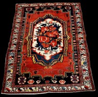 Lot 673 - A Bakhtiari rug, the central foliate motifs...