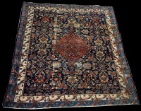Lot 676 - A Malayer rug, the central floral medallions...