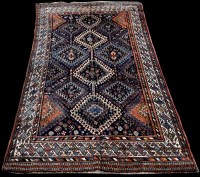 Lot 677 - A Qashqai carpet, the diamond-shaped panels...