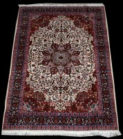 Lot 680 - An Isfahan rug, the central rosette surrounded...