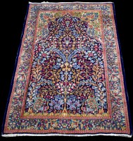 Lot 683 - A Kerman rug, with Tree of Life design within...