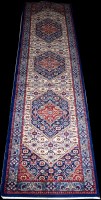 Lot 693 - A Tabriz runner, the three medallions with...