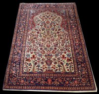 Lot 699 - An antique Kashan rug, with Tree of Life...