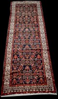 Lot 702 - A Malayer runner, with full floral decoration...