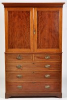 Lot 754 - An Edwardian mahogany press cupboard, the...