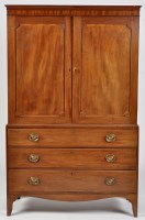 Lot 764 - A George III mahogany press cupboard, the...