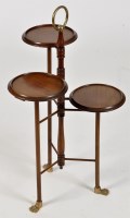 Lot 780 - An Edwardian mahogany three-tier cake stand,...