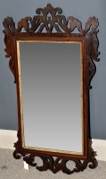 Lot 787 - A George III mahogany wall mirror, the...