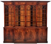 Lot 788 - A George III mahogany bookcase, the flared...