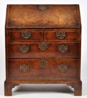 Lot 789 - A George II walnut bureau, with crossbanded...