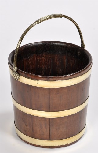 Lot 810 - A George III brass bound mahogany peat bucket,...