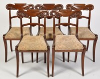 Lot 833 - A set of five Regency mahogany dining chairs,...