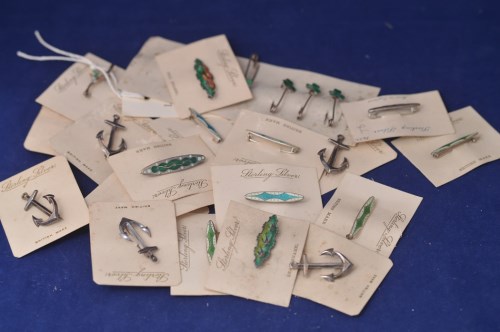 Lot 63 - A selection of twenty-three silver and enamel...