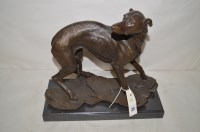 Lot 321 - A bronze figure of a greyhound on marble base...