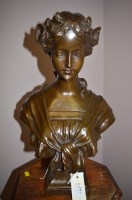 Lot 438 - A patinated bronze female bust (unsigned).