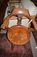 Lot 679 - An early 20th Century mahogany captain's chair,...