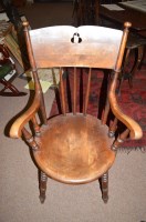 Lot 690 - A set of four Ibex type carver chairs, curved...