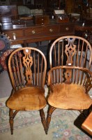Lot 719 - A set of six elm seat Windsor style dining...
