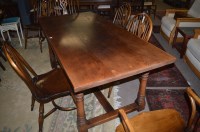 Lot 720 - A modern oak refectory style dining table,...