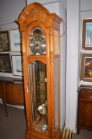 Lot 789 - A modern grandfather clock in carved and...