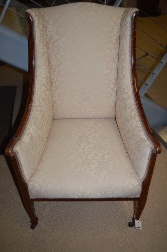 Lot 800 - An Edwardian inlaid mahogany wing armchair...