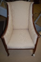 Lot 800 - An Edwardian inlaid mahogany wing armchair...