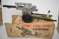 Lot 1712 - A Marx long range atomic cannon, boxed.