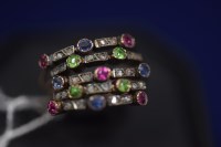 Lot 3 - A diamond and gem set multi-ring, each of the...