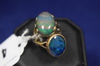 Lot 4 - An opal triplet ring, the oval cabouchon on...