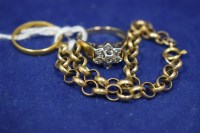 Lot 31 - A diamond cluster ring on 9ct. yellow gold...