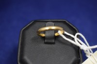 Lot 40 - A 22ct. yellow gold wedding band, ring size N,...