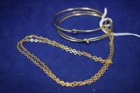 Lot 48 - A 9ct. yellow gold fine link chain necklace;...