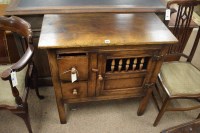 Lot 682 - A Reproduction carved and stained oak side...